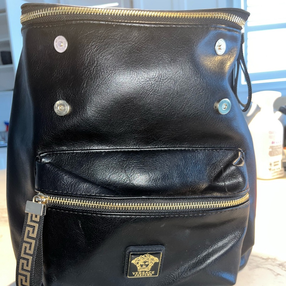 NWOT Versace Parfums black with gold hardware backpack. Lots of pockets